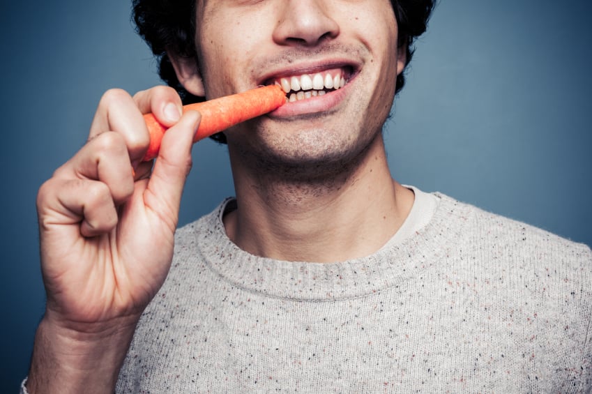 http://www.cheatsheet.com/wp-content/uploads/2015/08/Young-man-eating-a-carrot.jpg