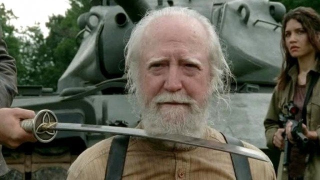 Hershel Green (Scott Wilson) looks forward as the Governor holds a katana to his neck in a scene from 'The Walking Dead'