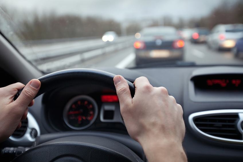 First person point of view of driving a car