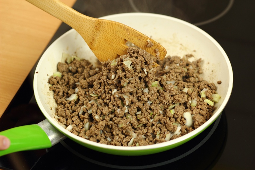 Making enchilada tortilla with beef