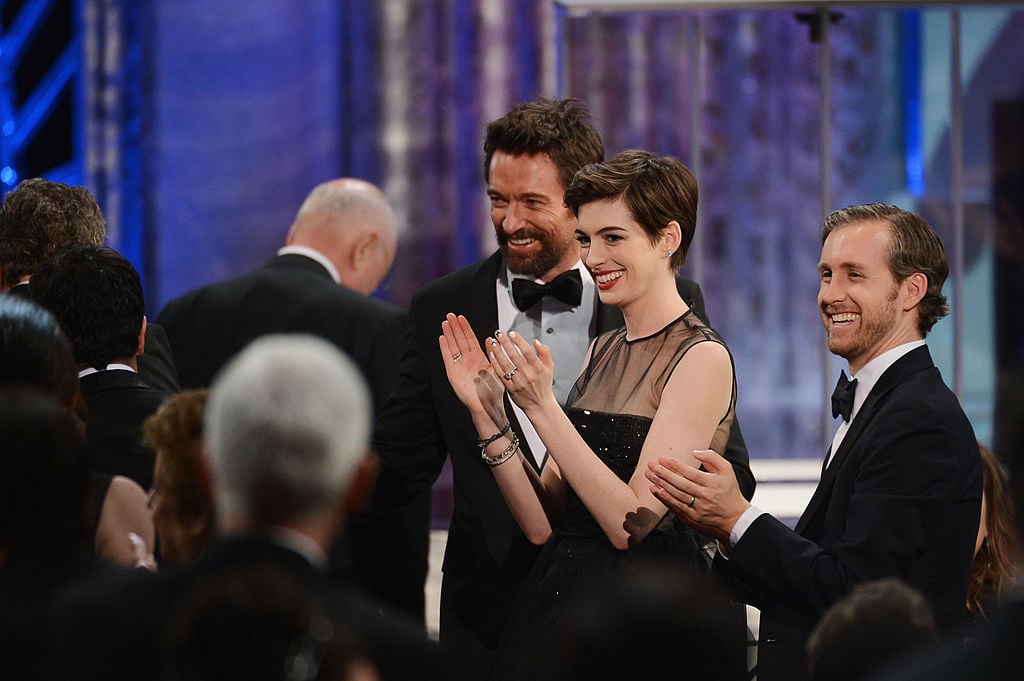 actorii Hugh Jackman, Anne Hathaway și Adam Shulman