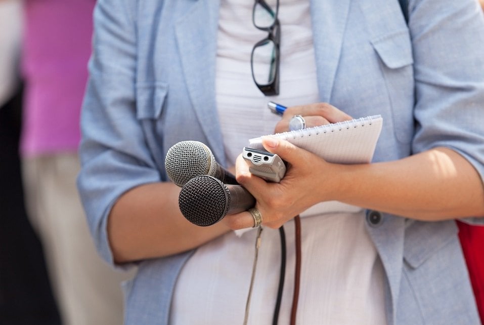 Reporter. Taking notes