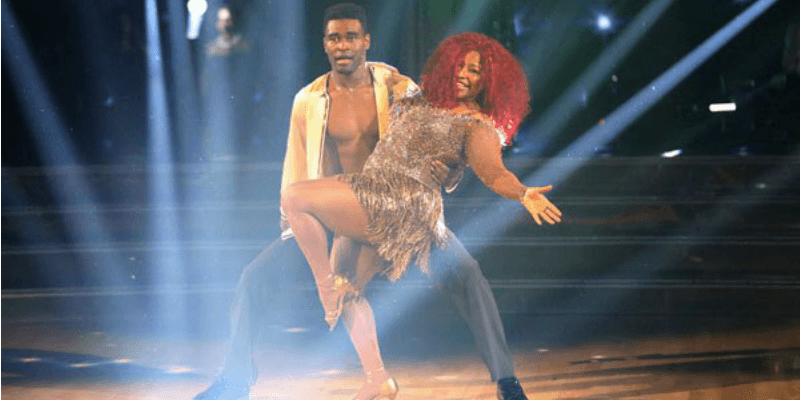 Chaka Khan is dipped by her partner on Dancing with the Stars.