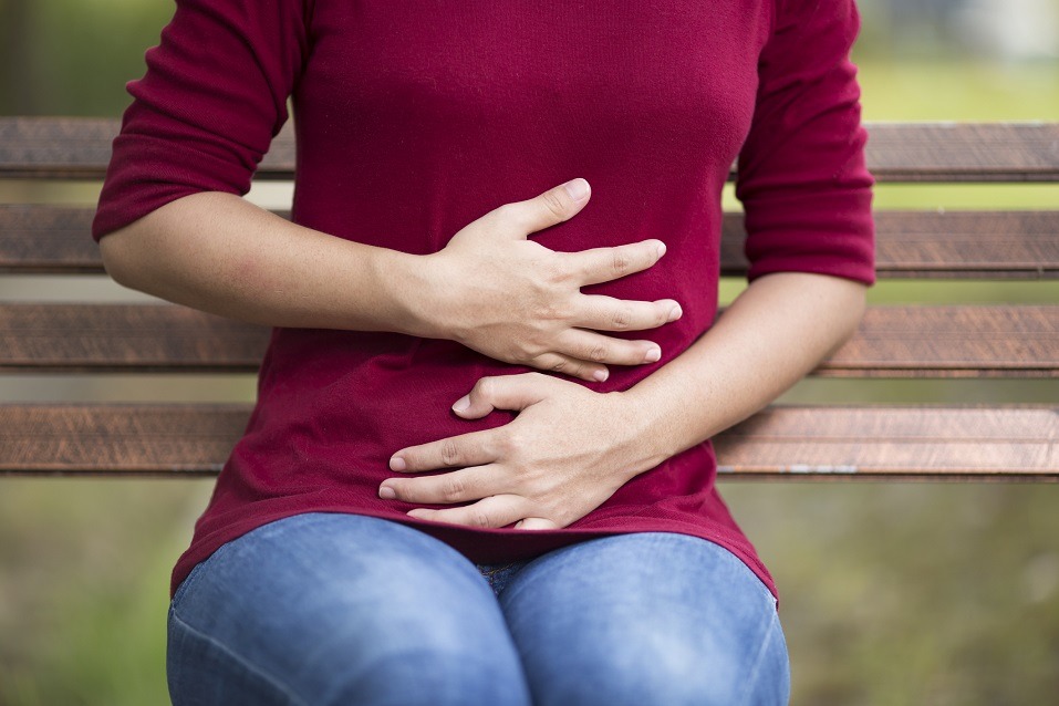 Woman Has Stomach Ache