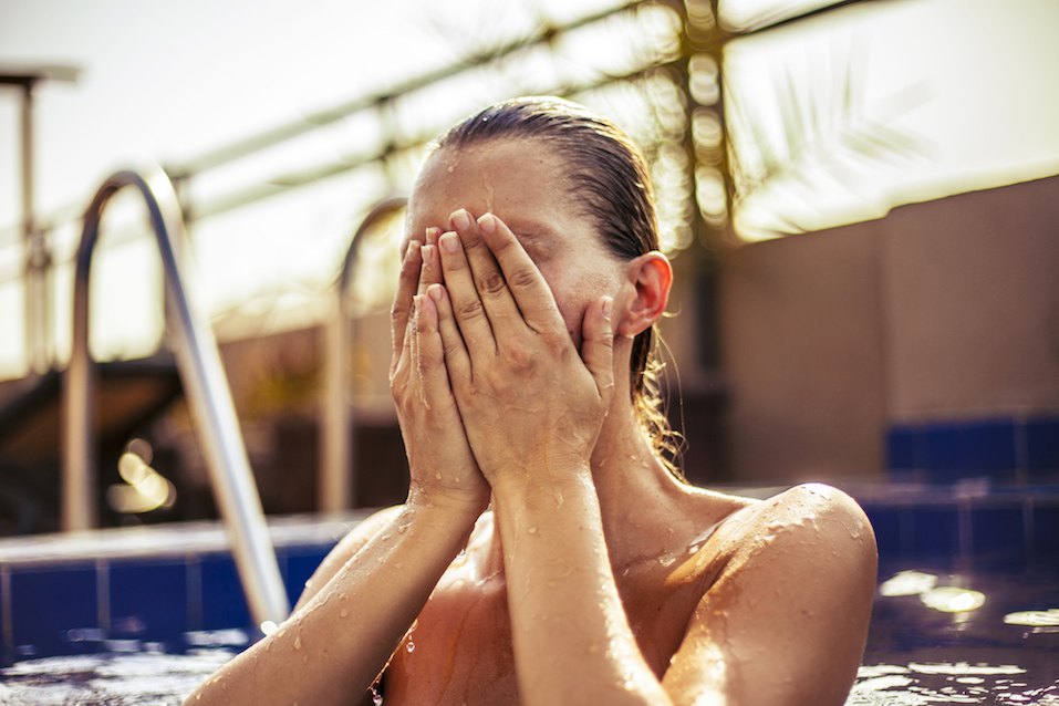 Woman swimming in the pool