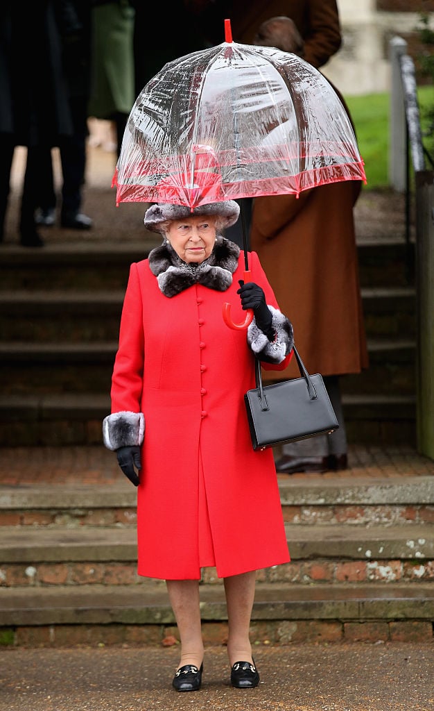 Why Does the Queen Always Carry a Purse? It Serves Multiple Purposes