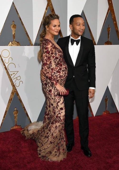 Model Chrissy Teigen (L) and recording artist John Legend attend the 88th Annual Academy Award