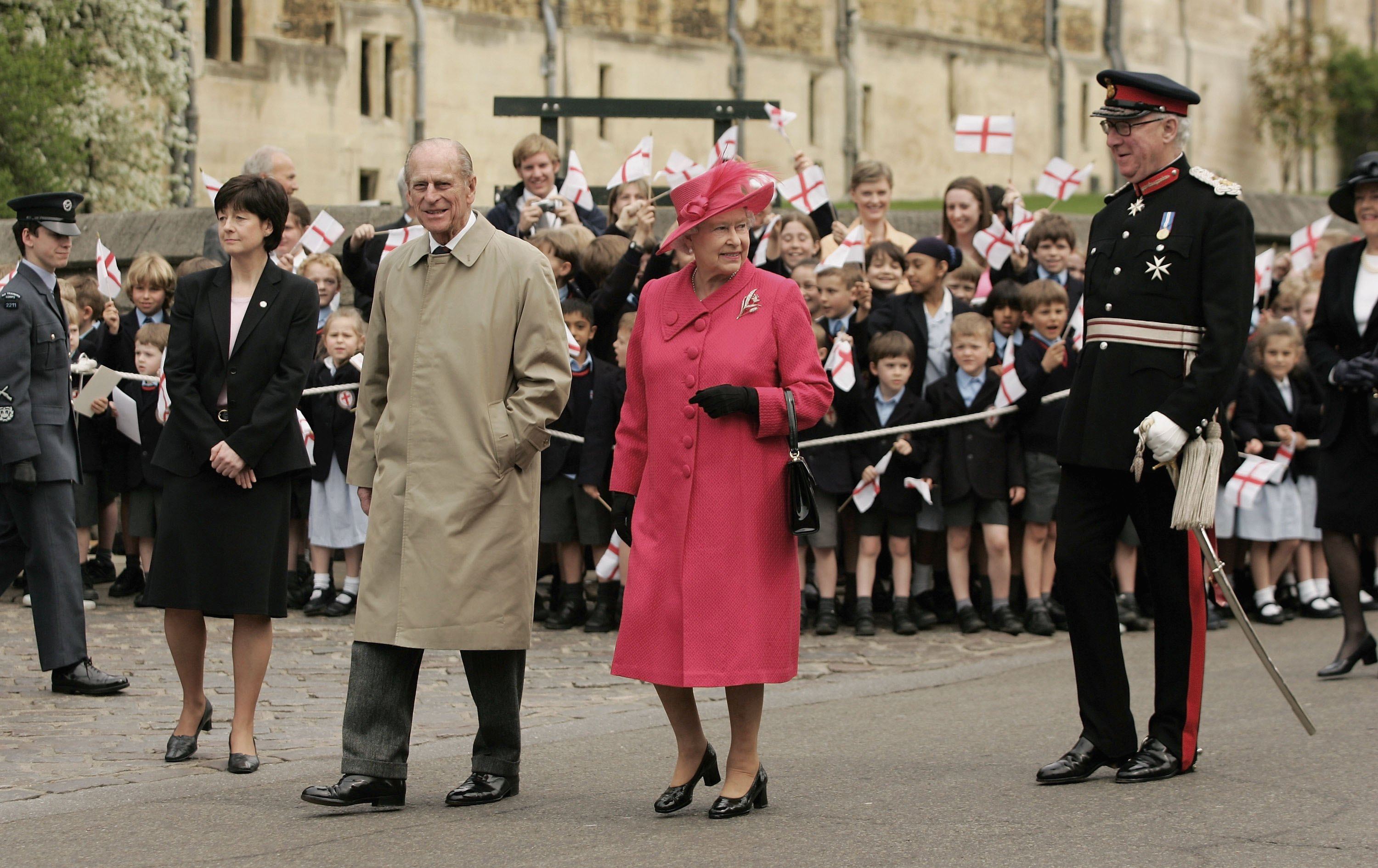 Queen Elizabeth II and Prince Philip, Duke of Edinburgh meet with well wishers on April 21, 2006 in Windsor, England. HRH Queen Elizabeth II is taking part in her traditional walk in the town to celebrate her 80th Birthday. In the evening the Prince of Wales will host a private party for The Queen and other members of the Royal family at Kew Palace.