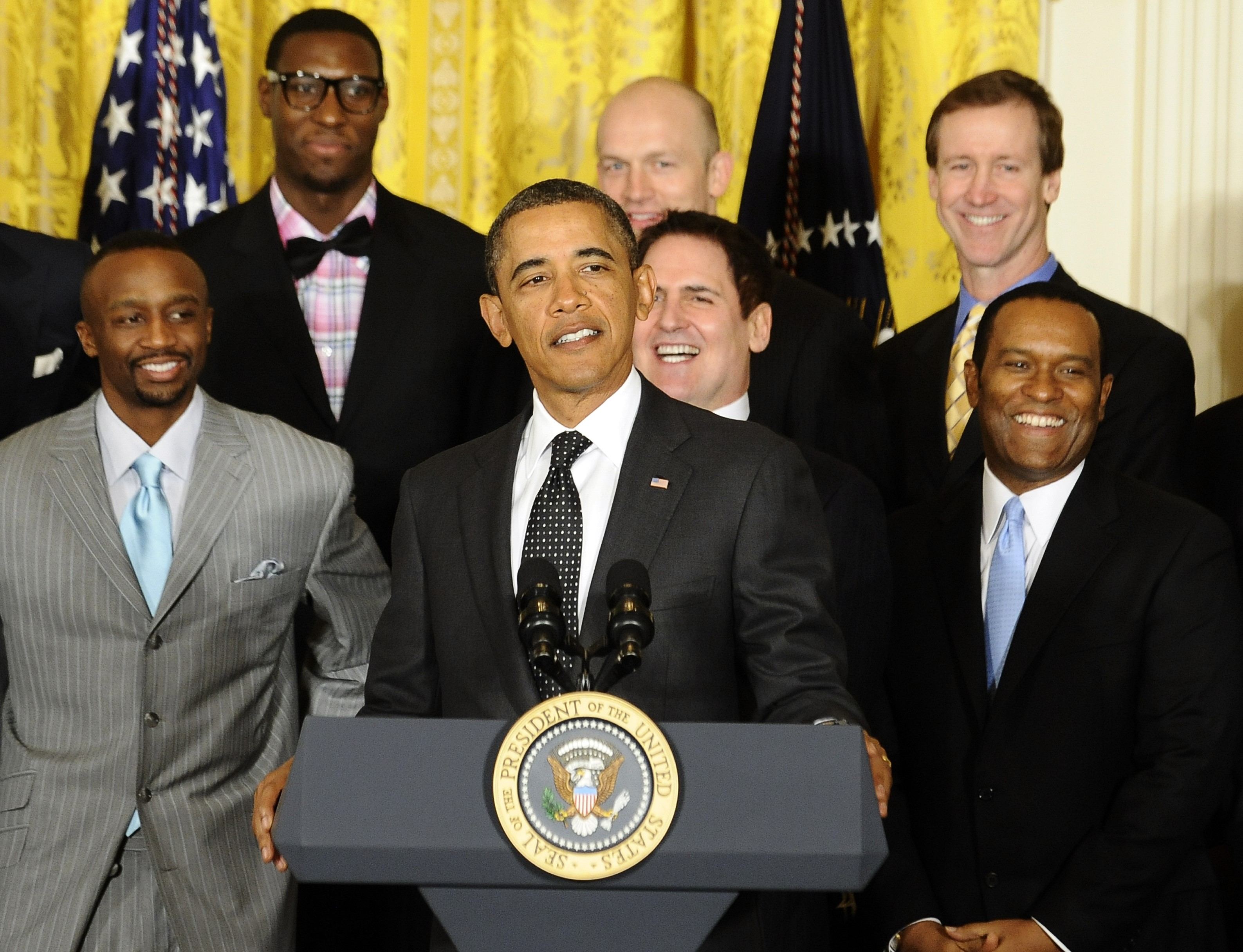 US President Barack Obama (C) speaks during Dallas Mavericks championship event