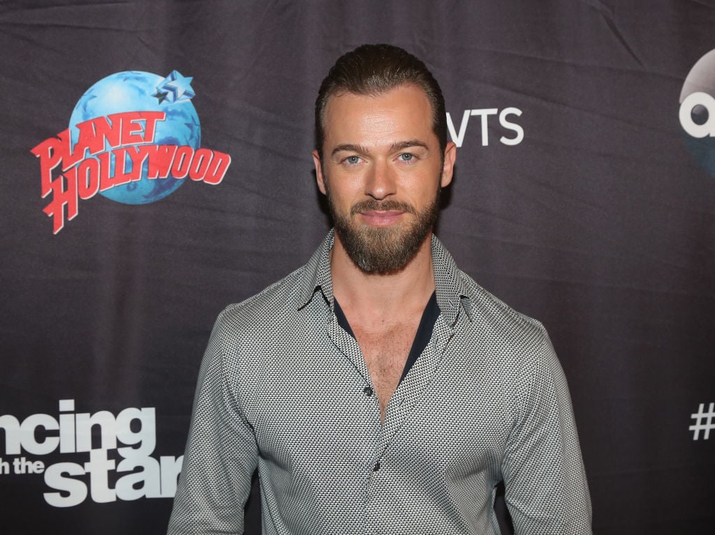 Artem Chigvintsev poses as the "Dancing with the Stars: Athletes Season 26" cast visits Planet Hollywood Times Square on April 13, 2018 in New York City.