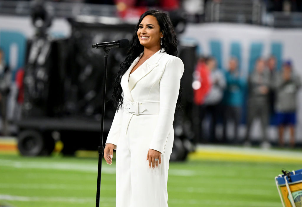 Demi Lovato performs the National Anthem onstage during Super Bowl LIV