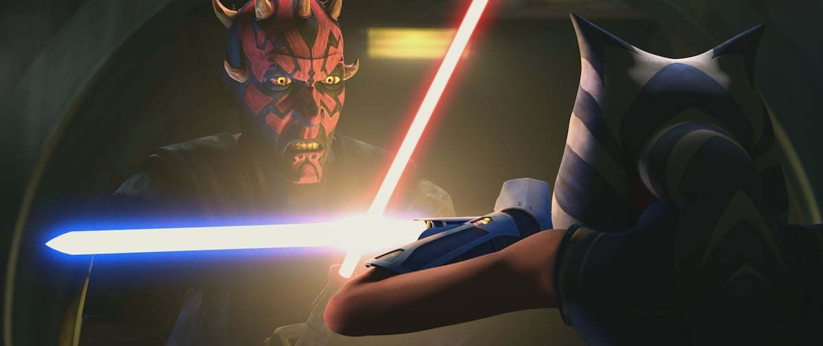 Maul stops Ahsoka's attacks in the tunnels of Mandalore.