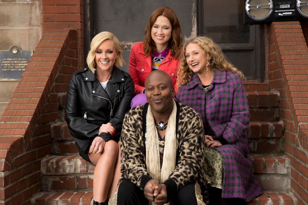 Jane Krakowski as Jacqueline White, Ellie Kemper as Kimmy Schmidt, Tituss Burgess as Titus Andromedon, Carol Kane as Lillian Kaushtupper