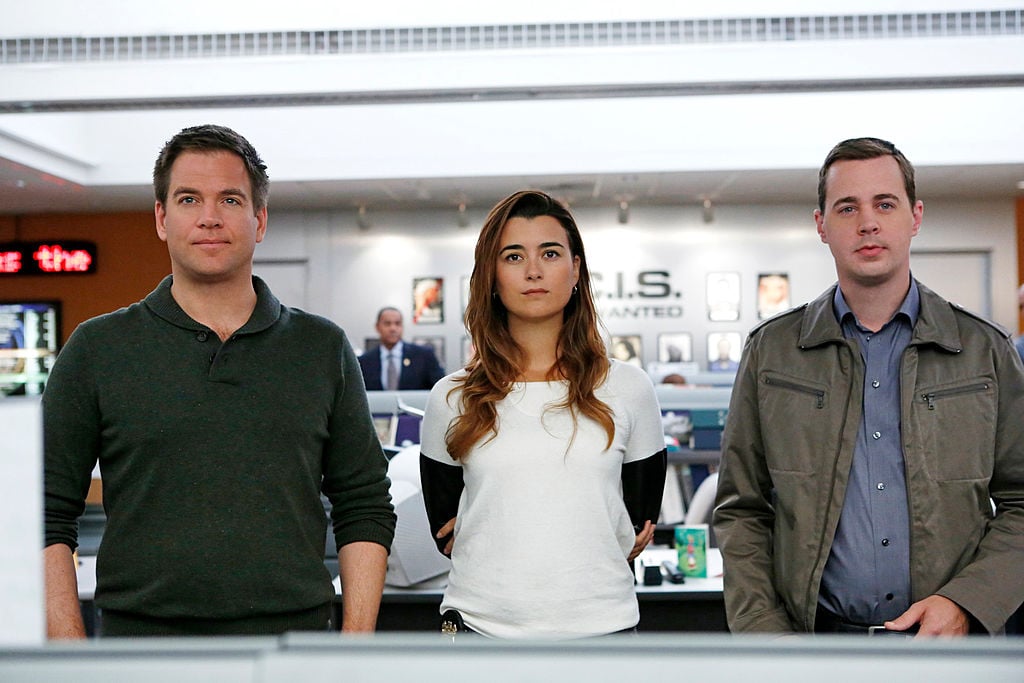 Michael Weatherly, Cote de Pablo, and Sean Murray on the set of NCIS | Cliff Lipson/CBS via Getty Images