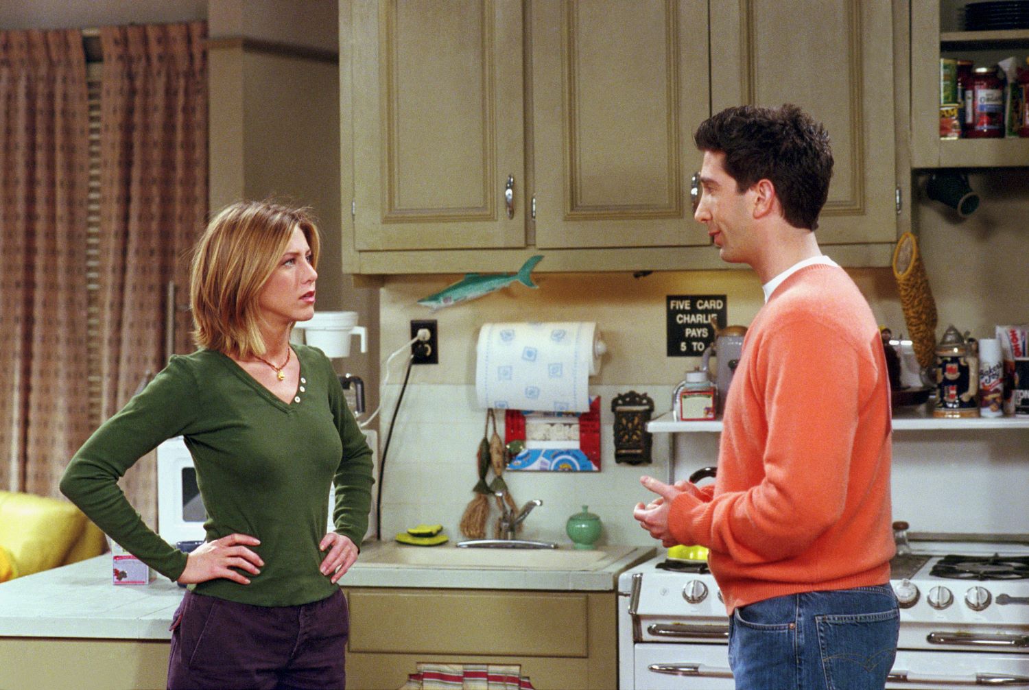 Jennifer Aniston and David Schwimmer film a scene for Friends in the iconic kitchen