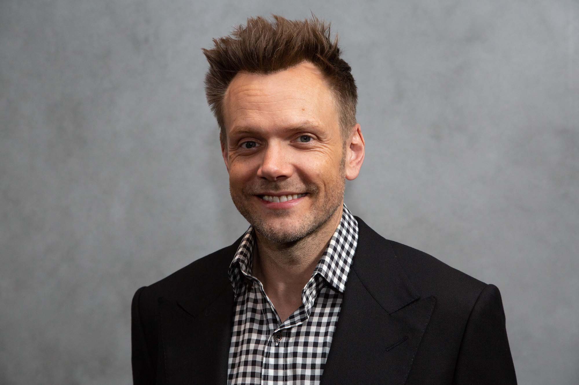 Joel mchale hair plugs