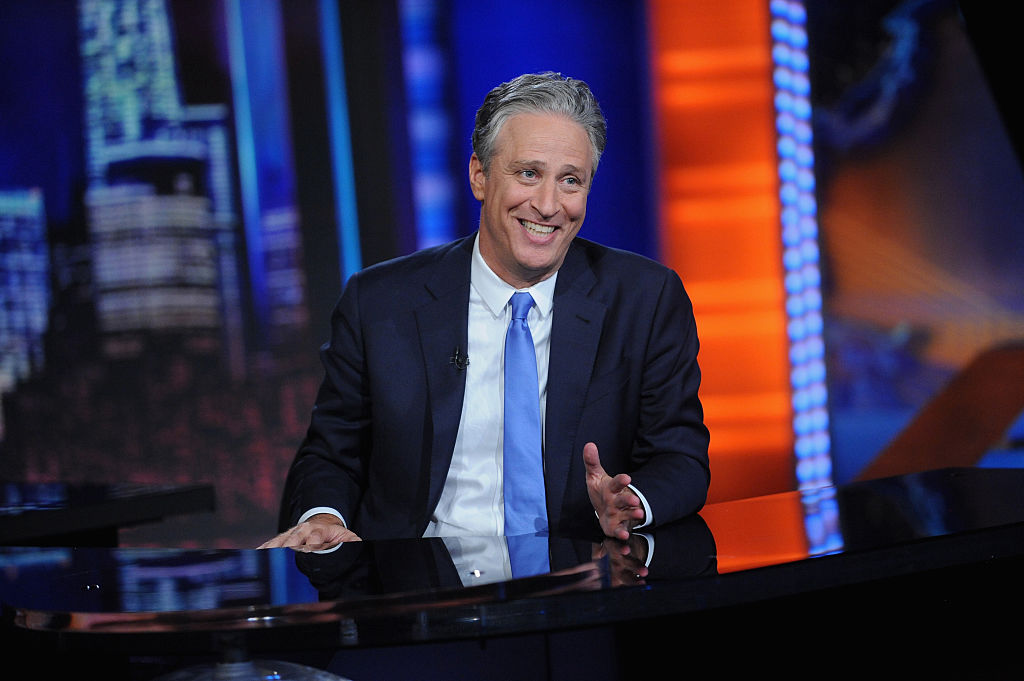 Jon Stewart smiling on 'The Daily Show'