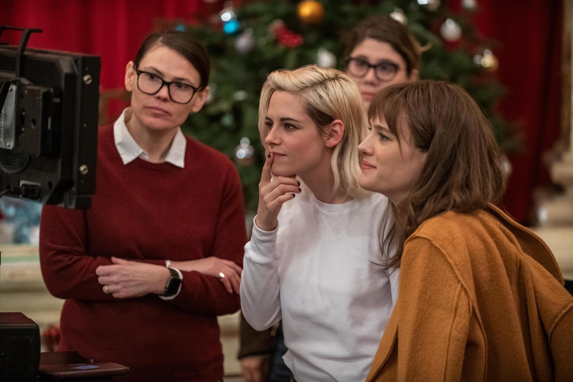 Clea DuVall (writer/director), Kristen Stewart (who plays Abby), and Mackenzie Davis (who plays Harper) on the set of 'Happiest Season'