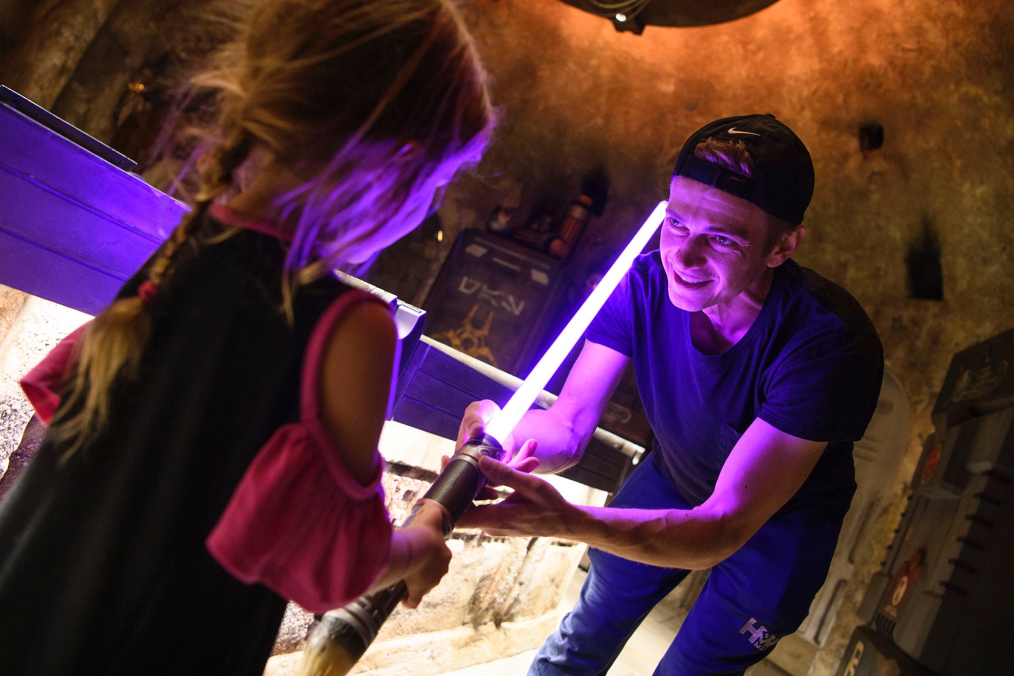 Hayden Christensen with his daughter building a custom lightsaber with his daughter at Star Wars: Galaxys Edge at Disneyland Park on Oct. 29, 2019