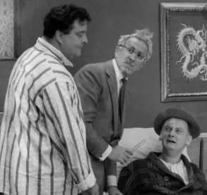 Character actor George Petrie, center, with (left) Jackie Gleason as Ralph Kramden and Art Carney (right) as Ed Norton in a scene from 'The Honeymooners'