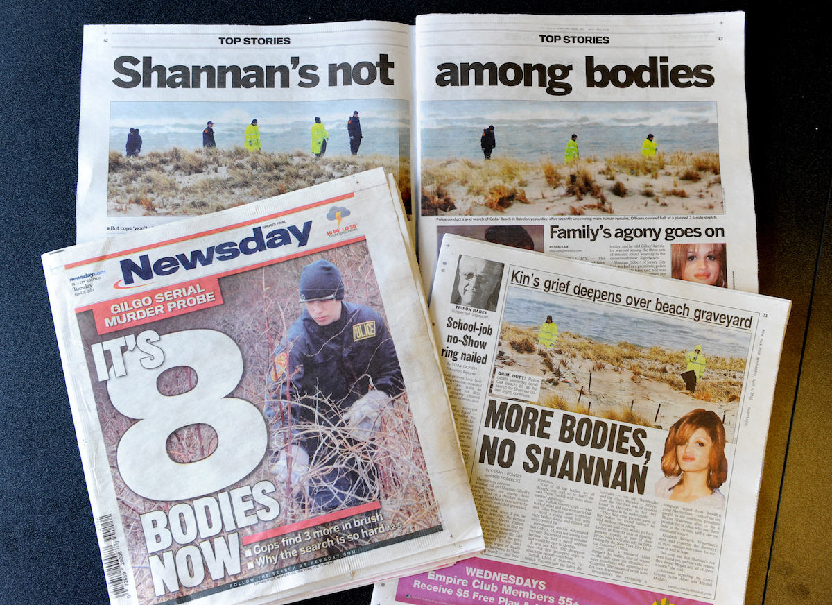 Newspapers with headline about the Long Island serial killer case