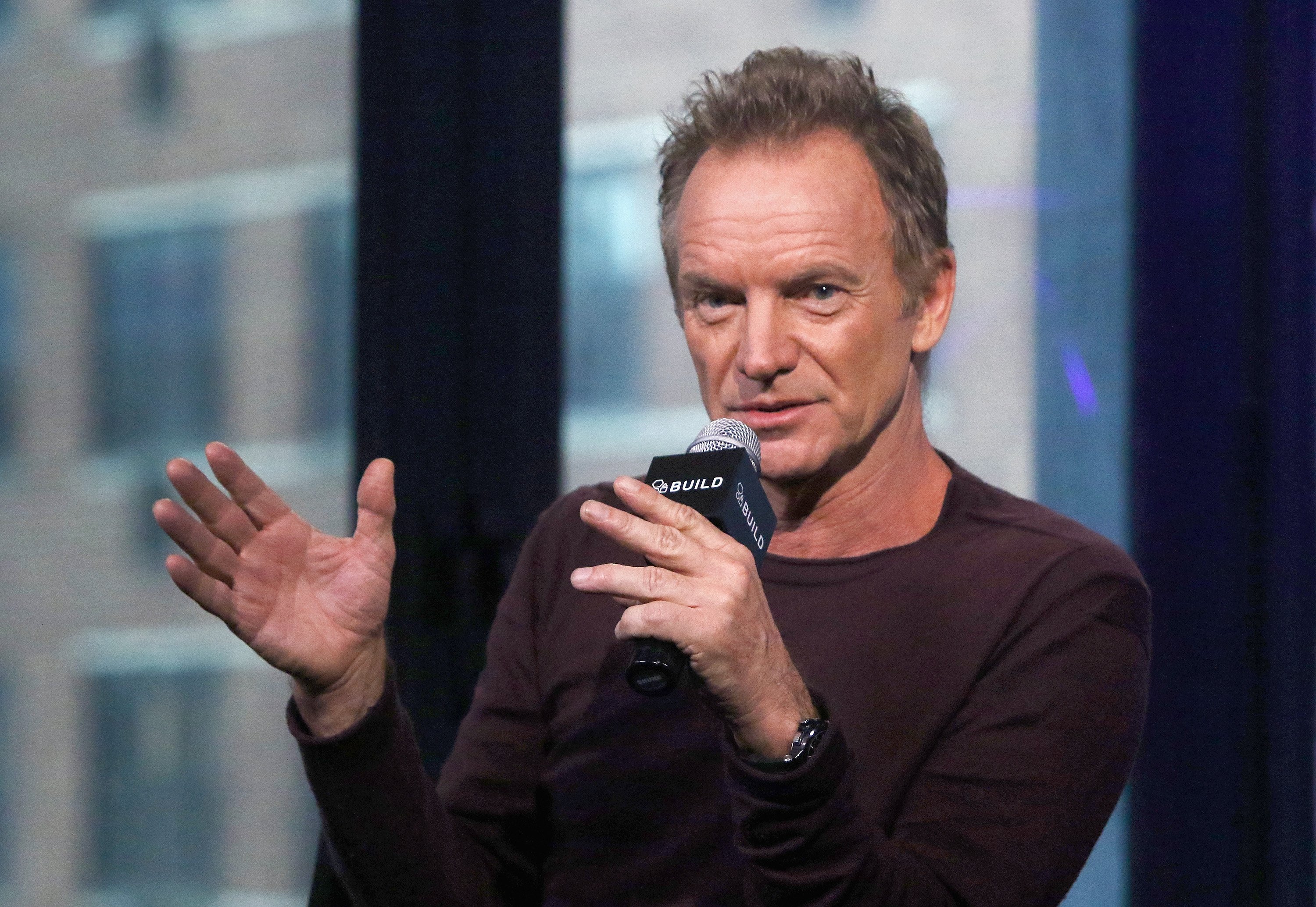 Singer/songwriter Sting speaking at an event in 2016