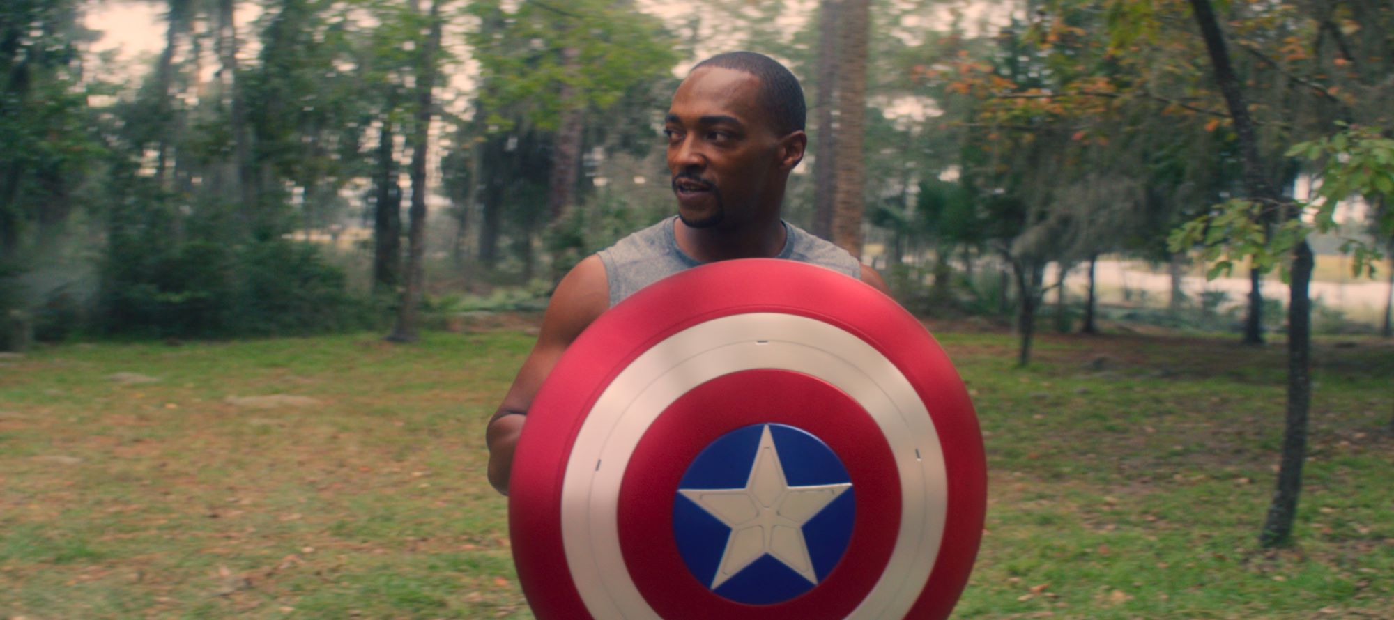 Anthony Mackie holding the Captain America shield in 'The Falcon and the Winter Soldier'