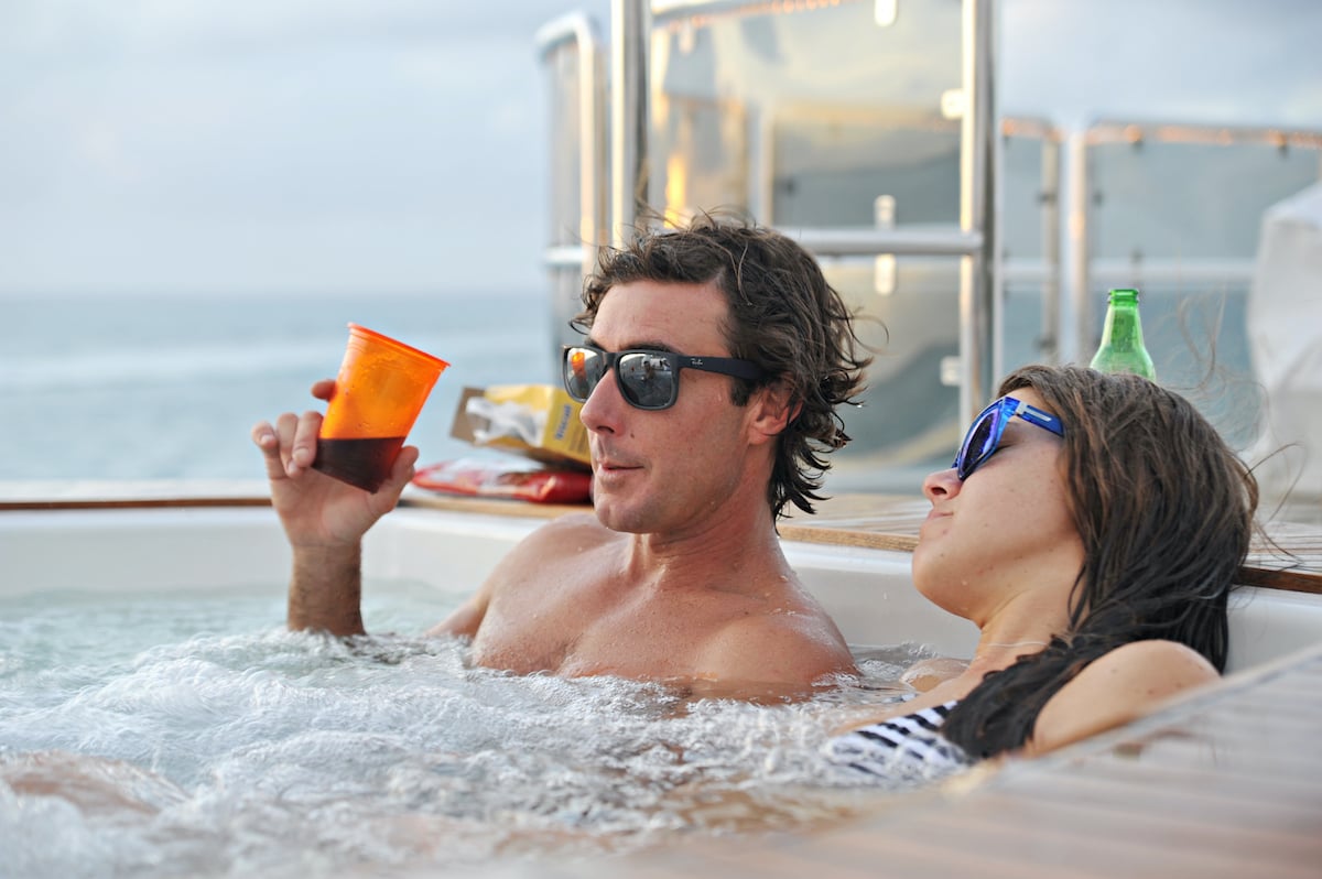 C.J. Lebeau and Samantha Orme chill in a hot tub