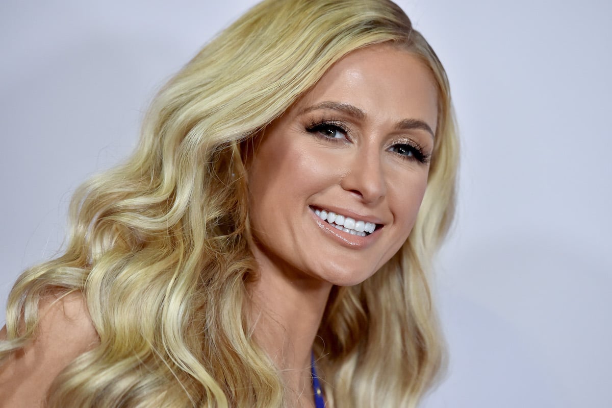 Paris Hilton Confronts the Artist Who Photoshopped 'Stop Being Poor' Shirt