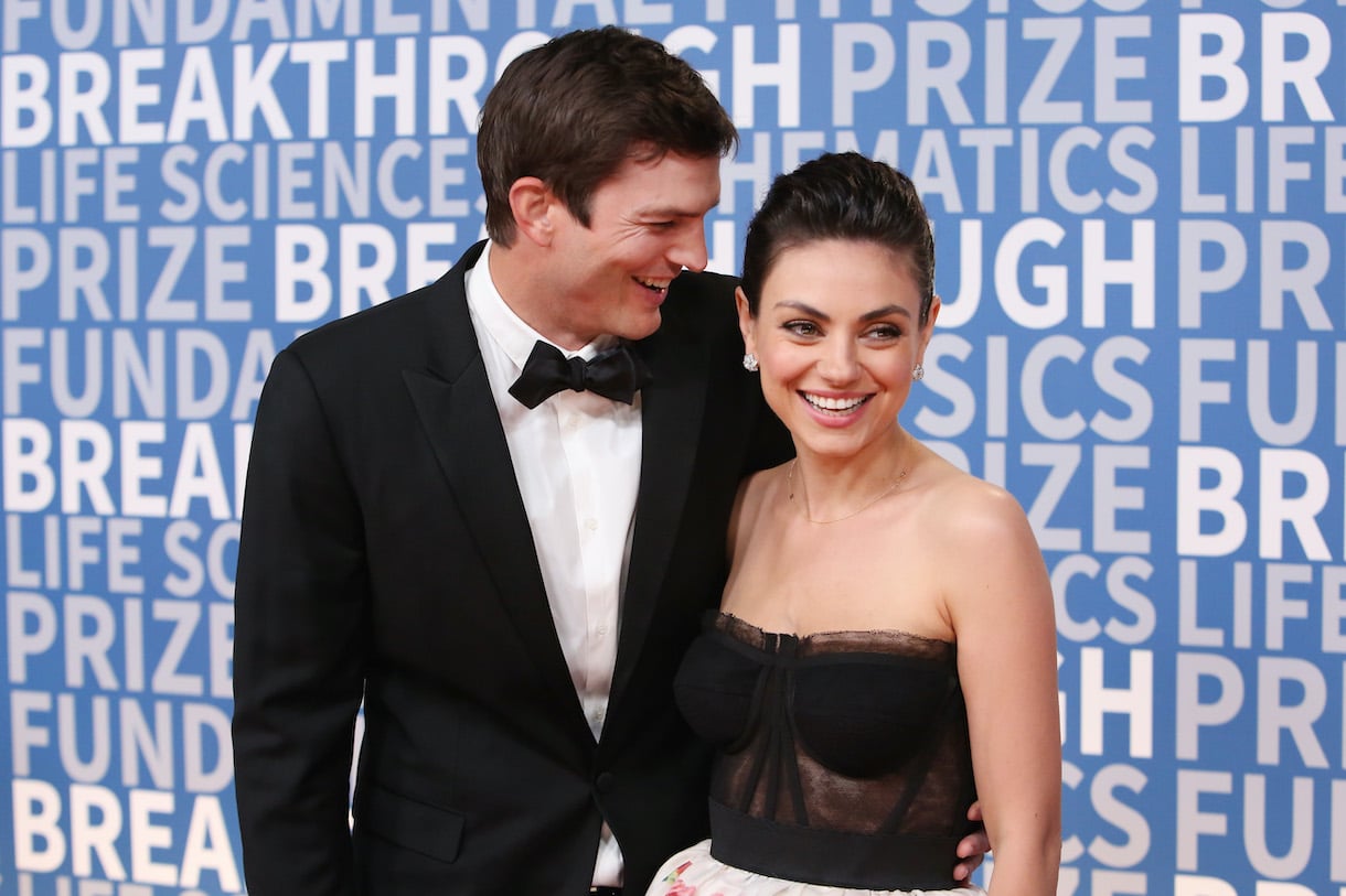 Actors Ashton Kutcher (L) and Mila Kunis attend the 2018 Breakthrough Prize at NASA Ames Research Center