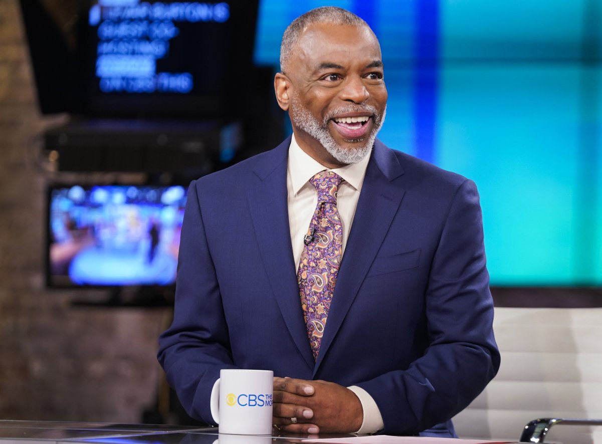 Wearing a suit and print tie, LeVar Burton smiles while guest anchoring on 'CBS This Morning.'