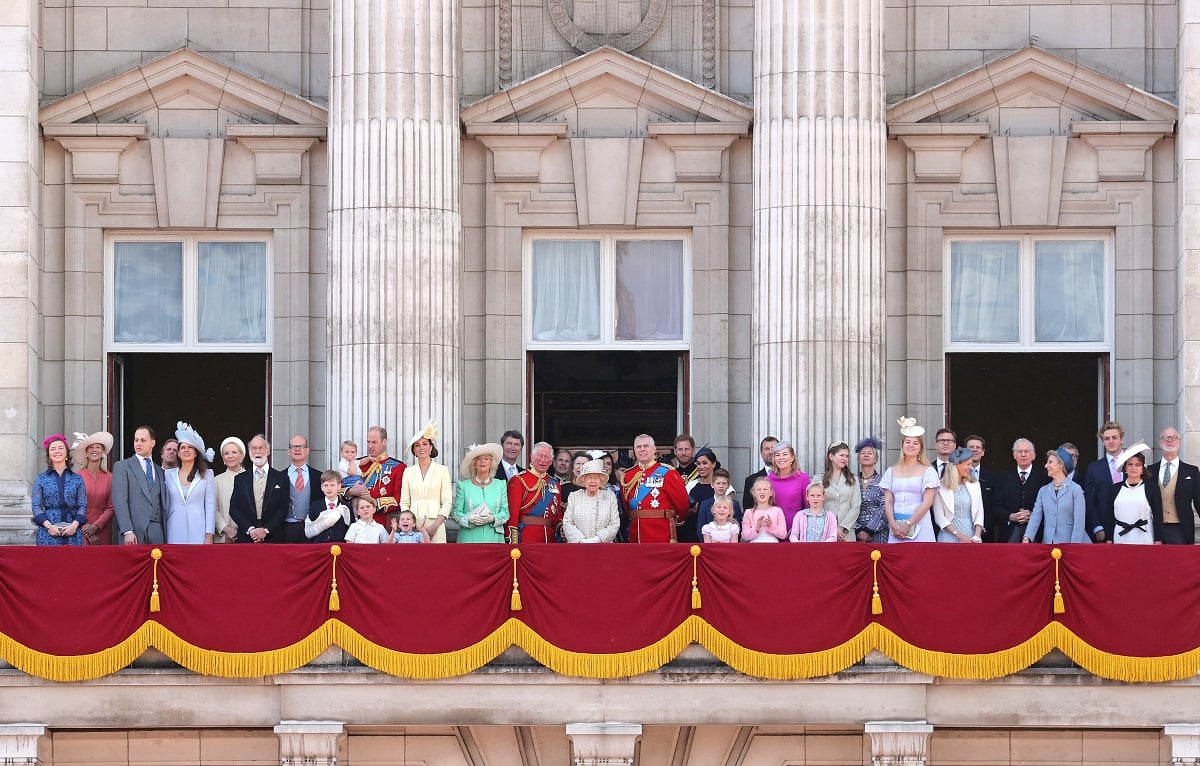 Members of Britain's royal family standing on the balcony of Buckingham Palace to watch a fly-past