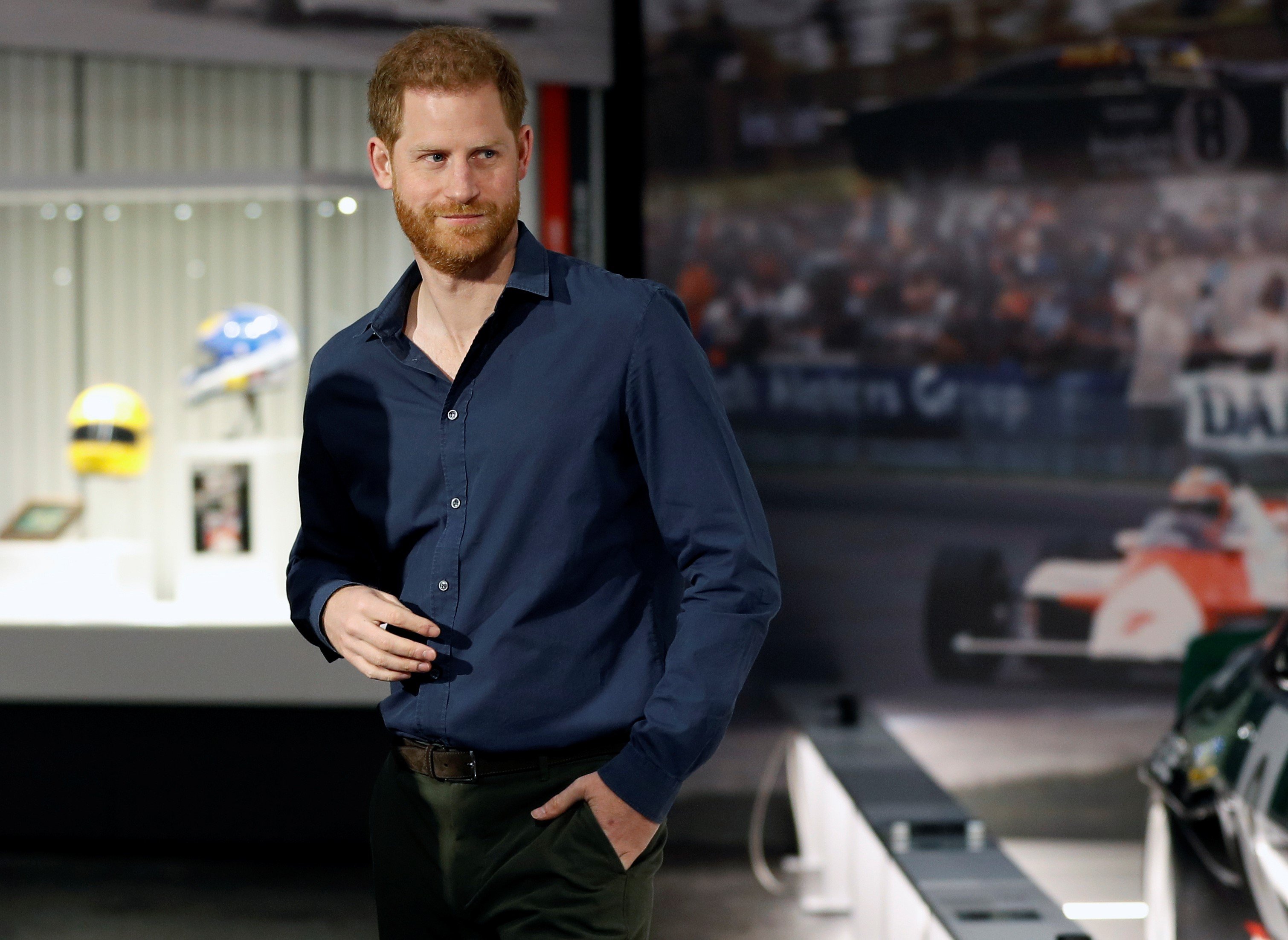 Prince Harry walking around the exhibition at The Silverstone Experience