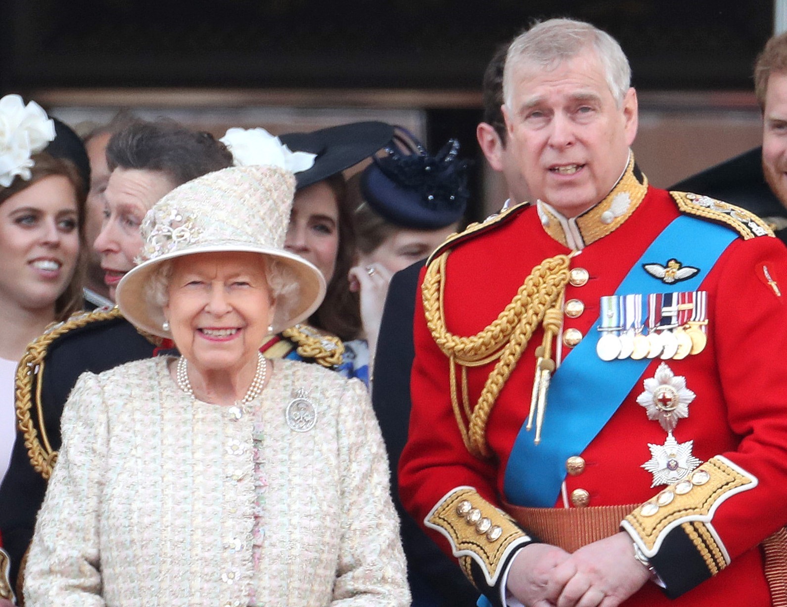 Queen Elizabeth II, Prince Andrew, and other members of the royal family standing on the Buckingham Palace balcony