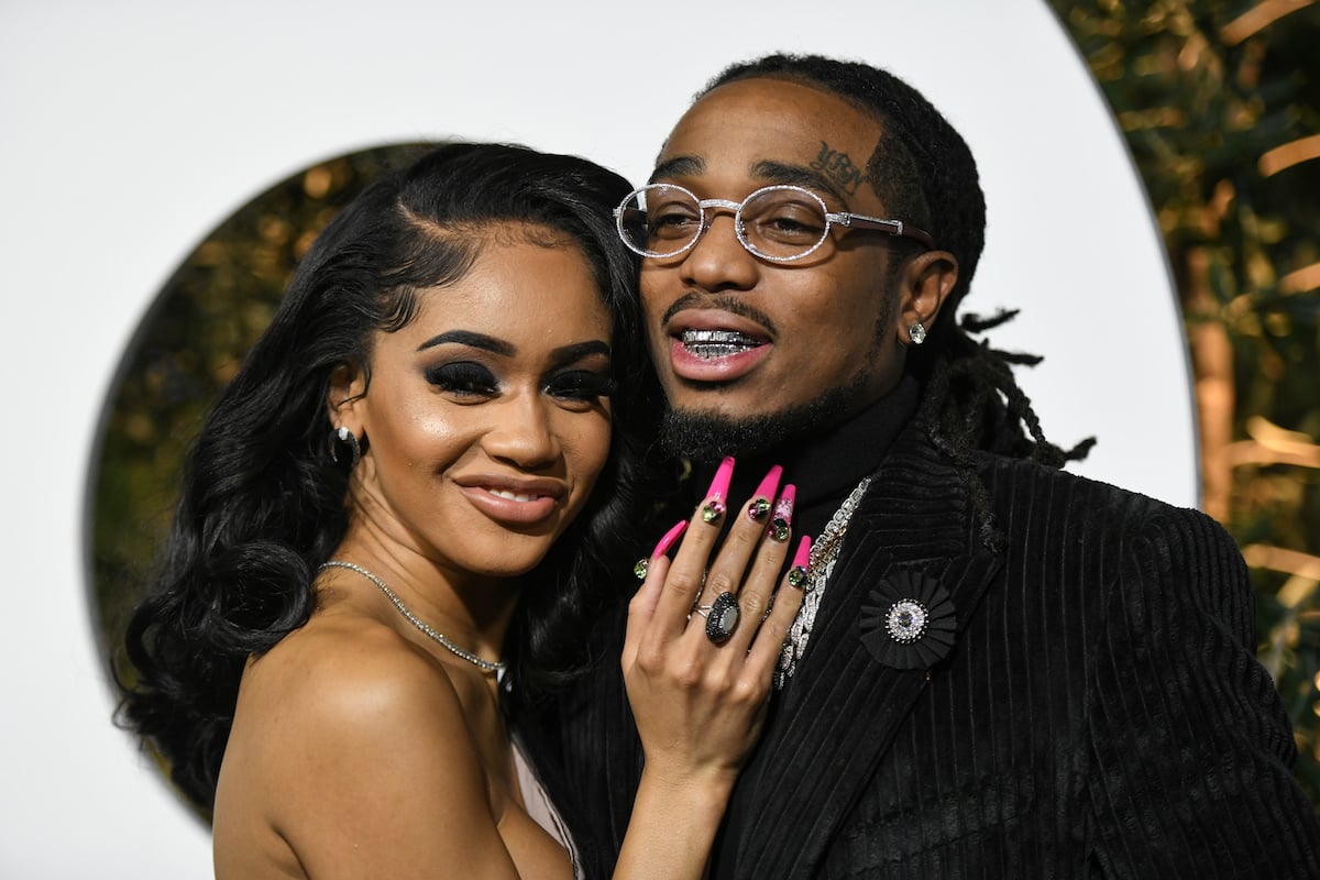 Saweetie embraces Quavo as they pose for a photo on the red carpet