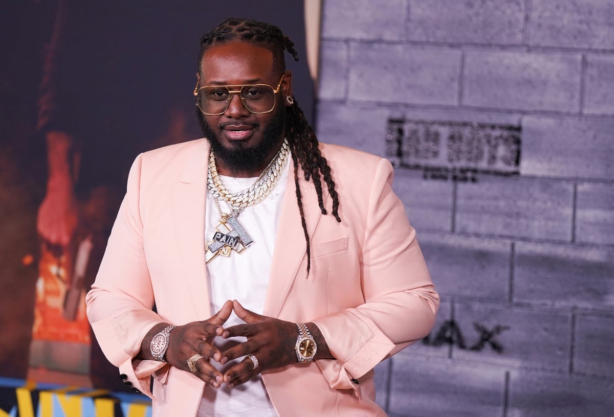 T-Pain wearing a pink suit jacket while heattends premiere of ‘Bad Boys for Life’ in January 2020 in Hollywood, California