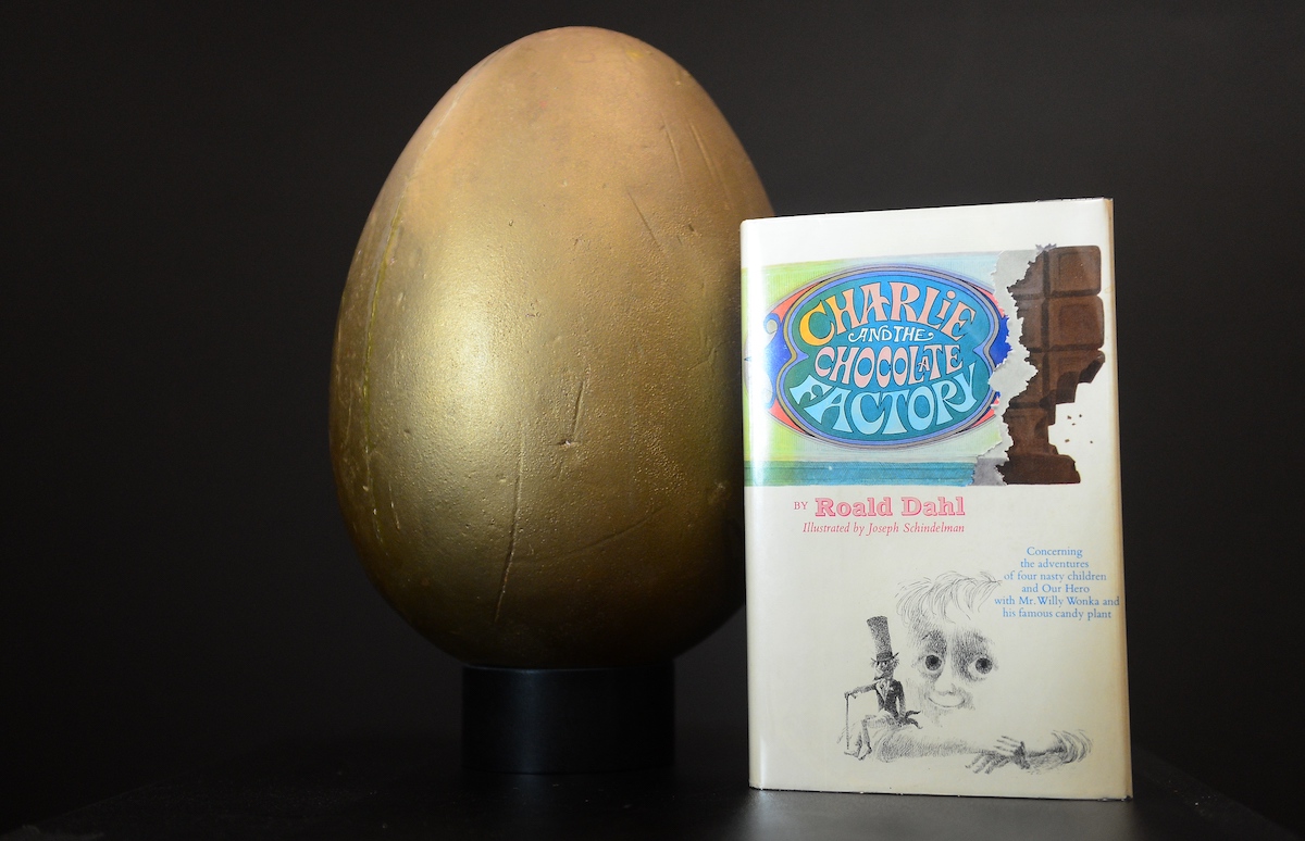 The first edition book 'Charlie and the Chocolate Factory' and the original hero Golden Egg from the film "Willy Wonka and the Chocolate Factory" on display at Profiles In History in Calabasas, northwest of downtown Los Angeles. Netflix will now adapt Roald Dahl's work into numerous projects