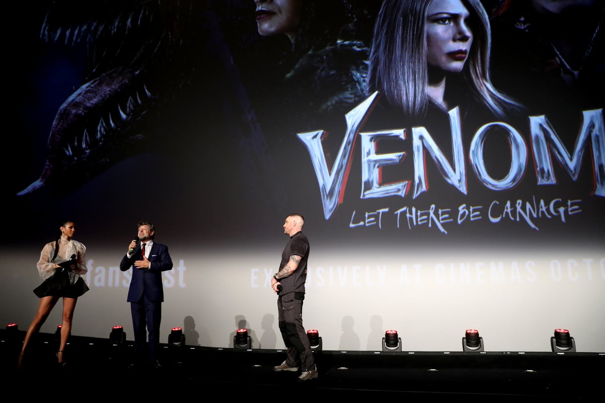 Vick Hope, Andy Serkis and Tom Hardy on stage at the fan screening of "Venom: Let There Be Carnage"