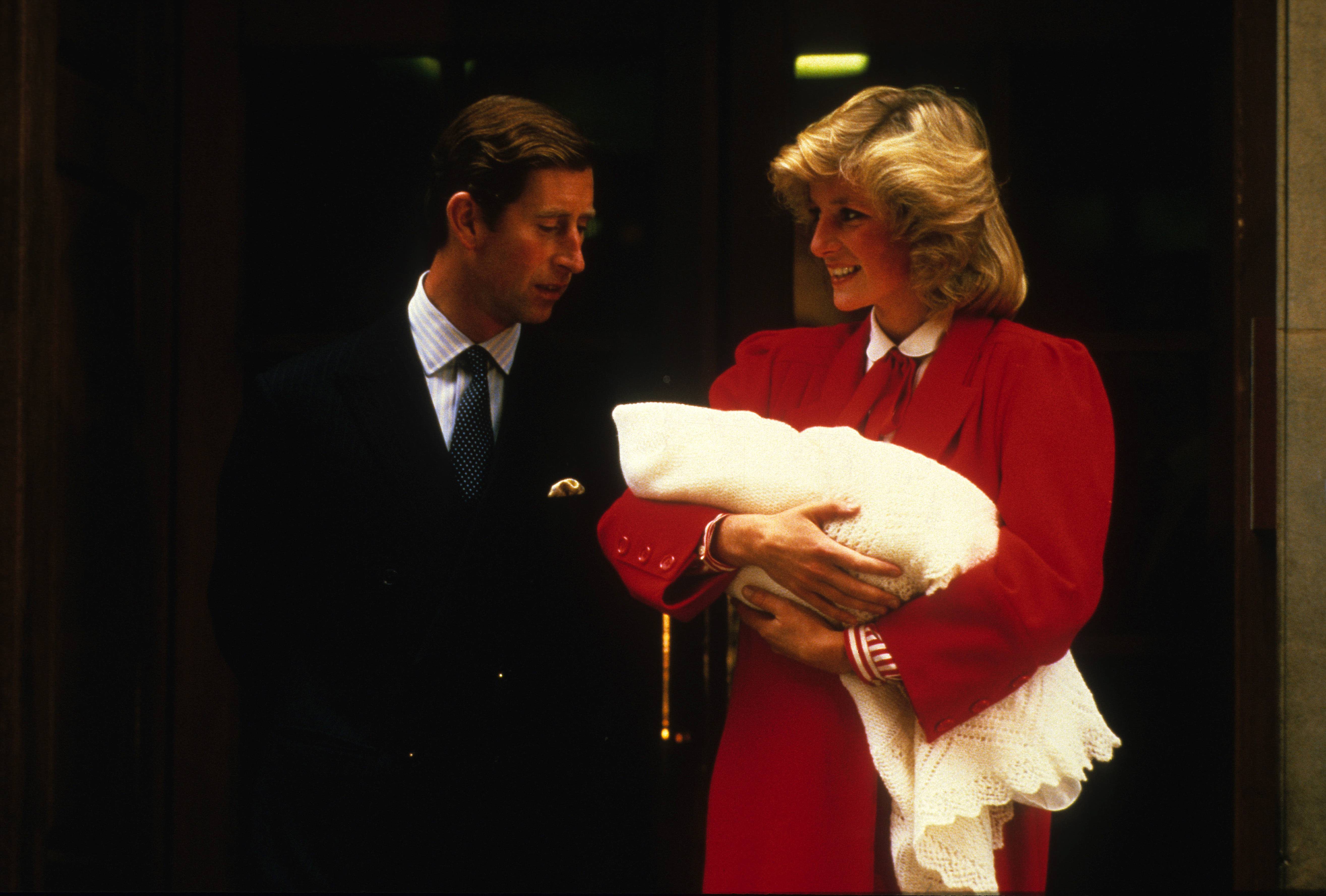 Prince Charles and Princess Diana leaving Lindo Wing with Prince Harry following his birth