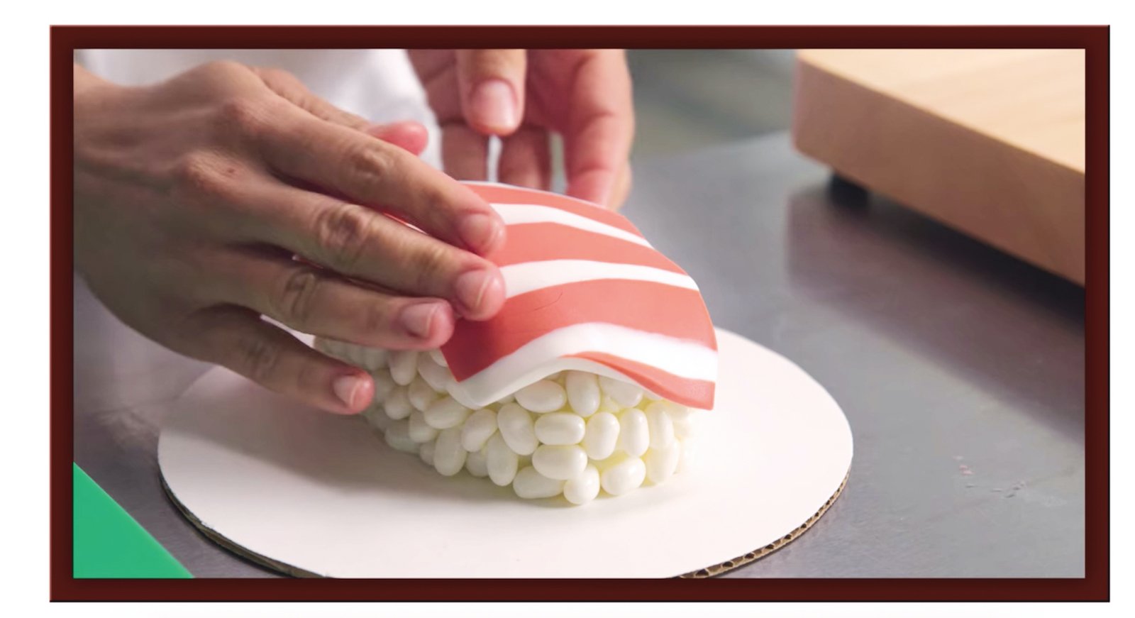 Create the 'fish' using fondant and food coloring