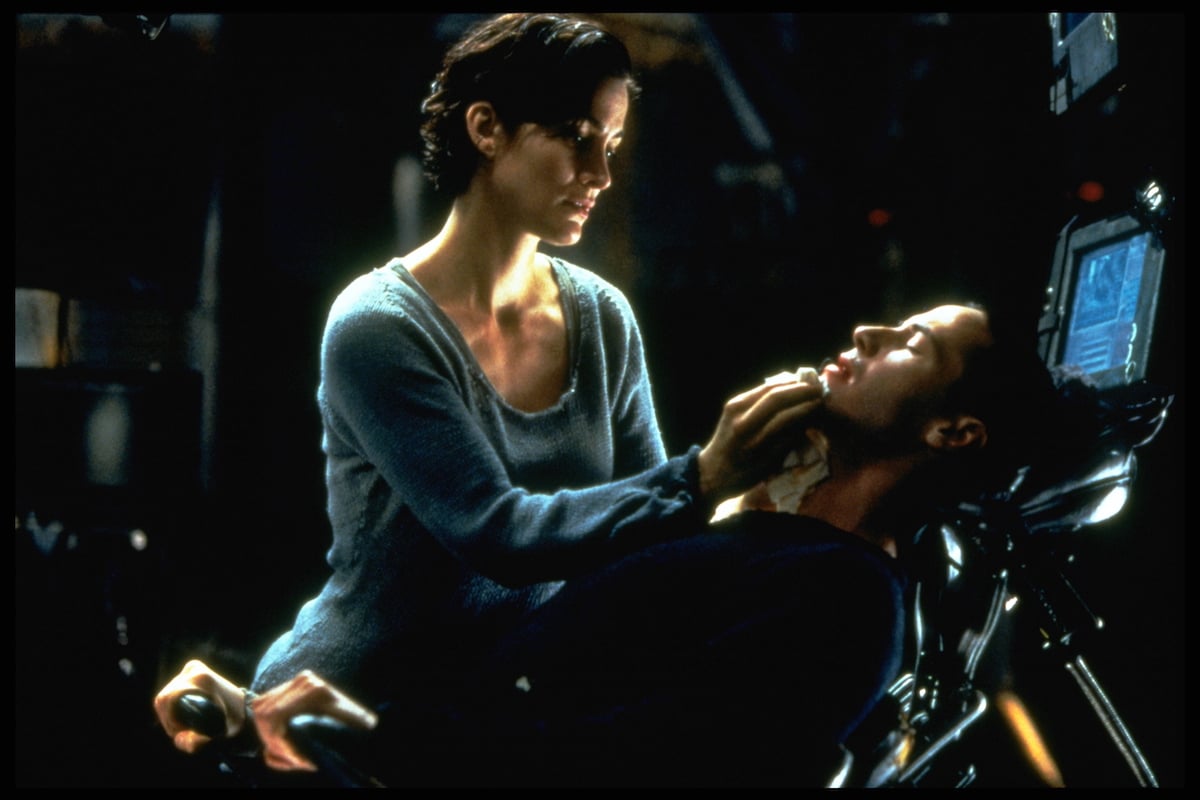 The Matrix: Carrie-Anne Moss and Keanu Reeves in a scene