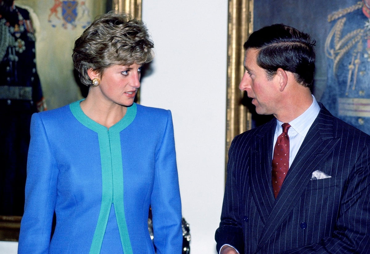 Prince Charles and Princess Diana glaring at each other during a visit to Ottawa