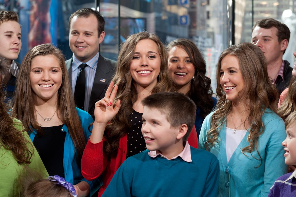 Josh Duggar with the Duggar family including some of his victims Joy-Anna Forsyth, Jessa Seewald, and Jinger Vuolo