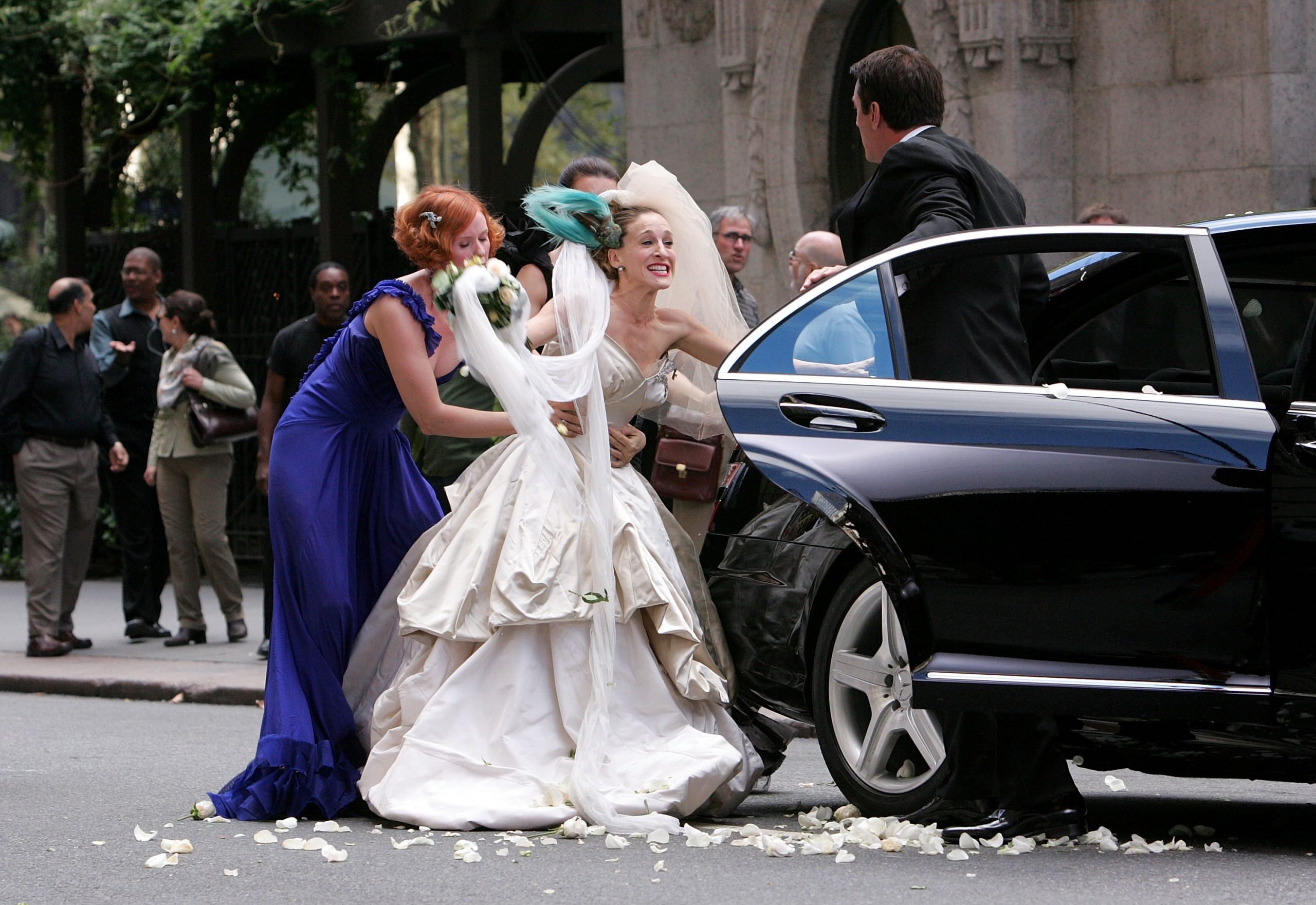 Cynthia Nixon, Kristin Davis and Sarah Jessica Parker with Chris Noth are seen in wedding attire on the set of 'Sex and the City: The Movie'. The scene played out after Mr. Big abandoned Carrie Bradshaw and their wedding. 