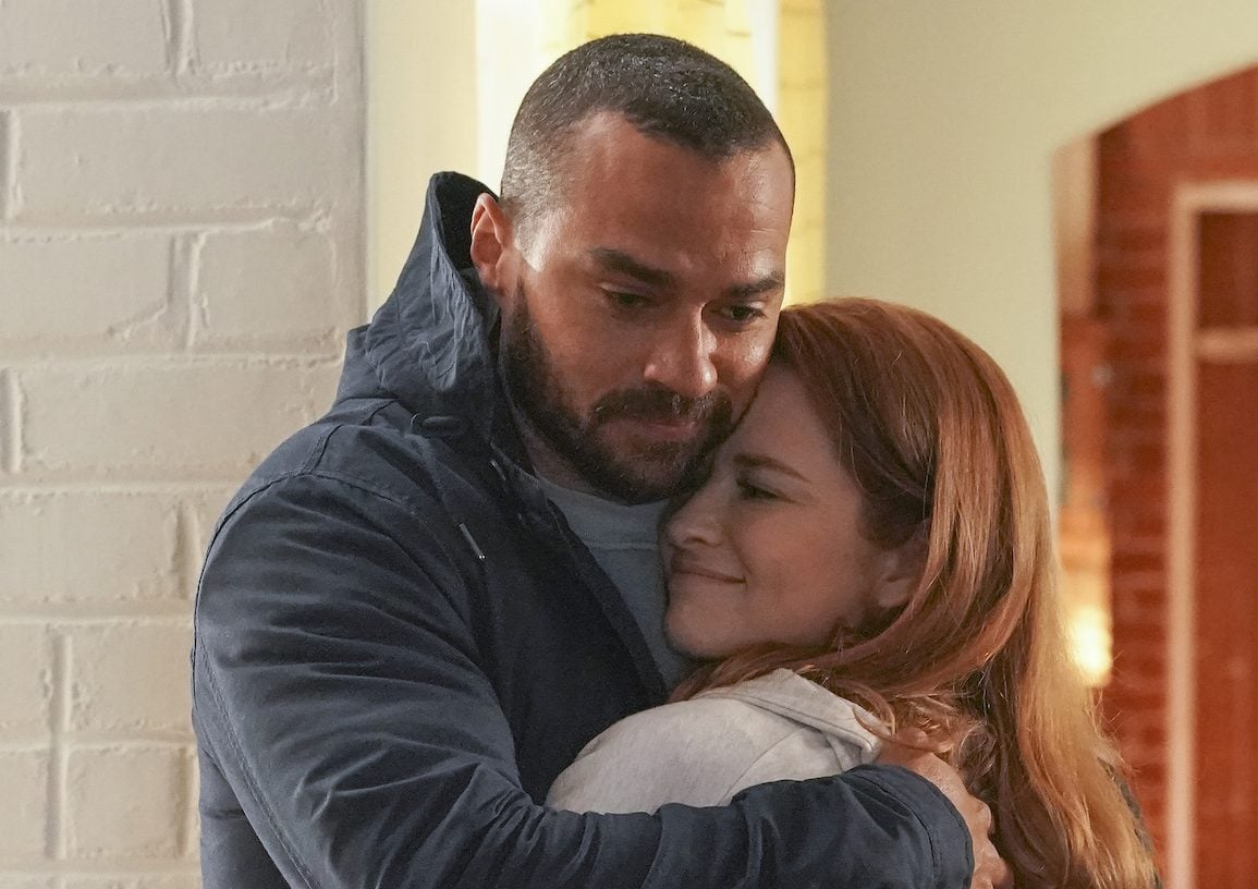 Sarah Drew and Jesse Williams hugging in 'Grey's Anatomy' Season 17.