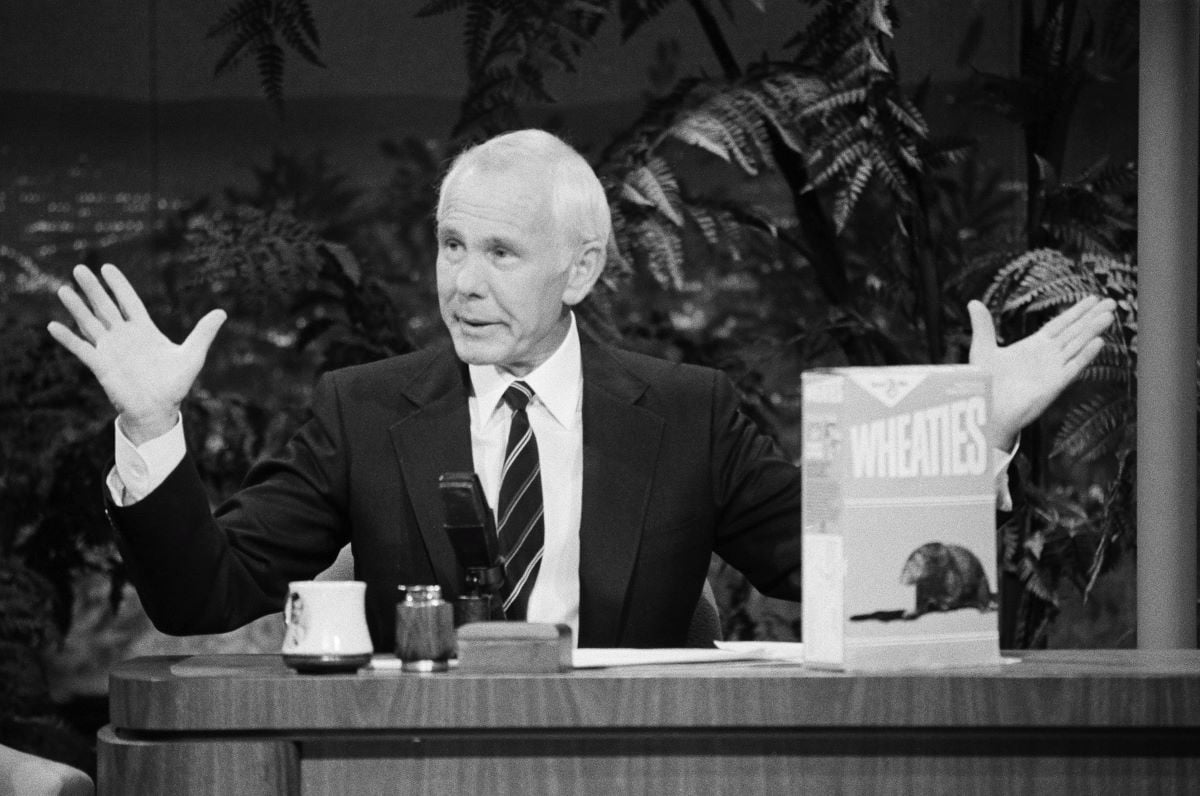 Johnny Carson sits at 'The Tonight Show' desk with a box of Wheaties.