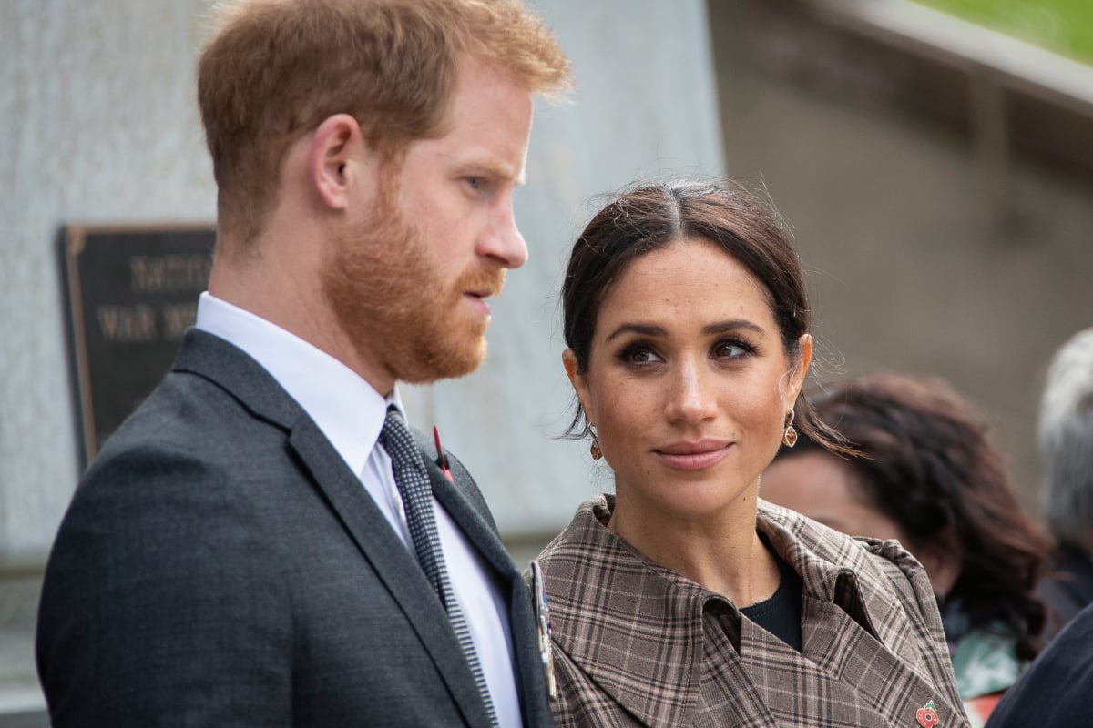 Meghan Markle and Prince Harry lay ferns and a wreath at the tomb of the Unknown Warrior at the newly unveiled UK war memorial and Pukeahu National War Memorial Park, on October 28, 2018