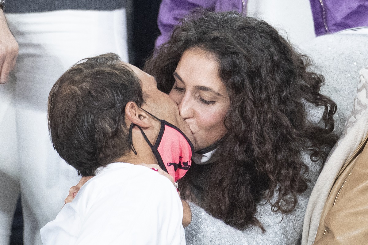 Xisca Perello gives husband Rafael Nadal a congratulatory kiss