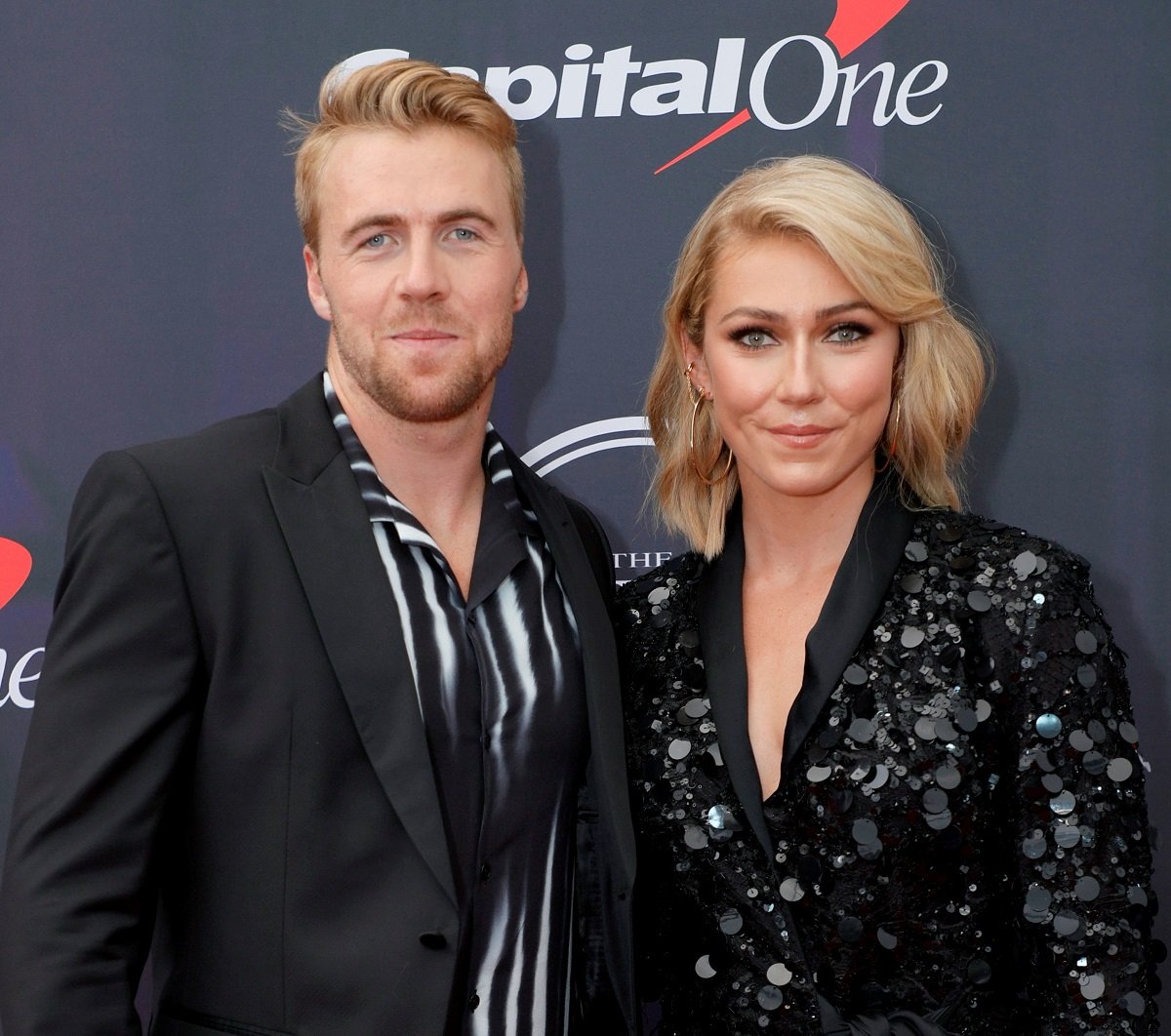 Aleksander Aamodt Kilde and Mikaela Shiffrin smile for a photo on the red carpet at the 2021 ESPY Awards