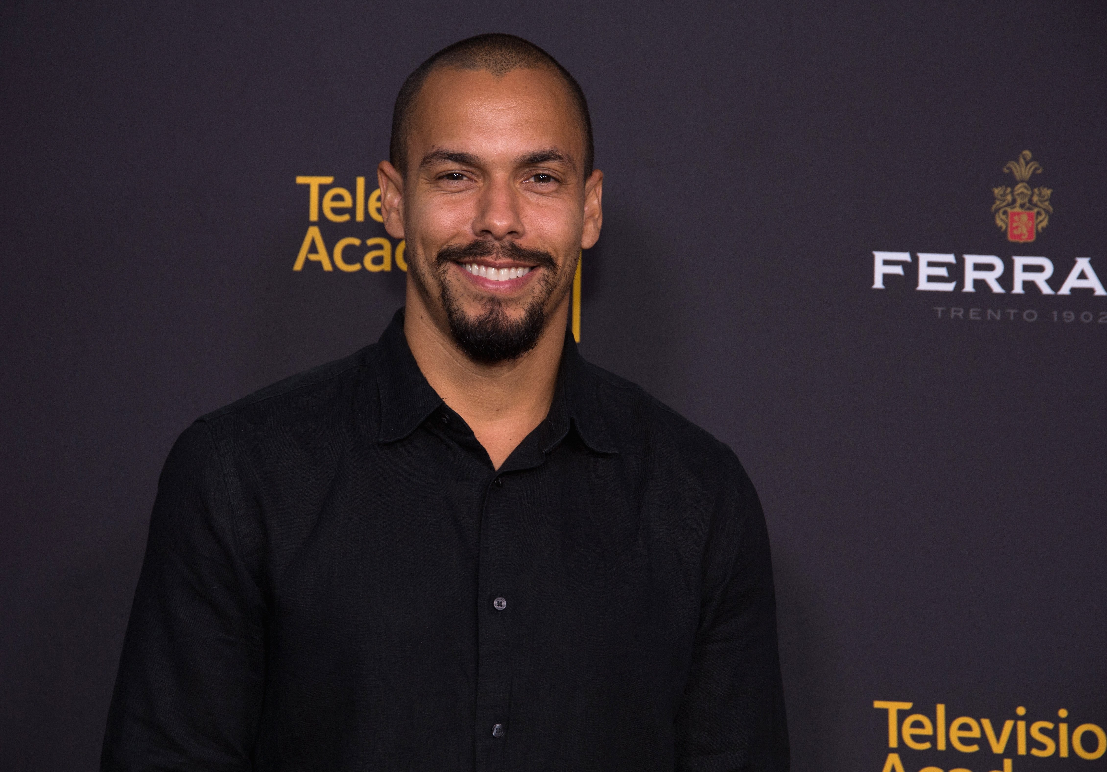 'The Young and the Restless' actor Bryton James wearing a black shirt during a red carpet appearance.